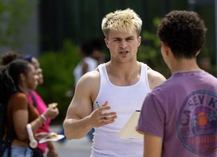 students talking on campus
